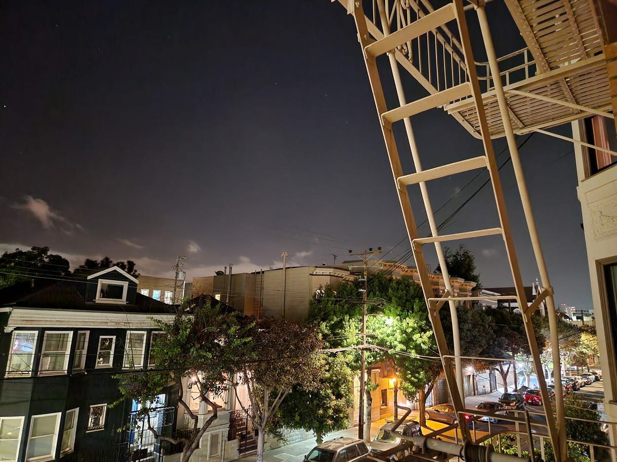 A fire escape overlooking neighboring buildings